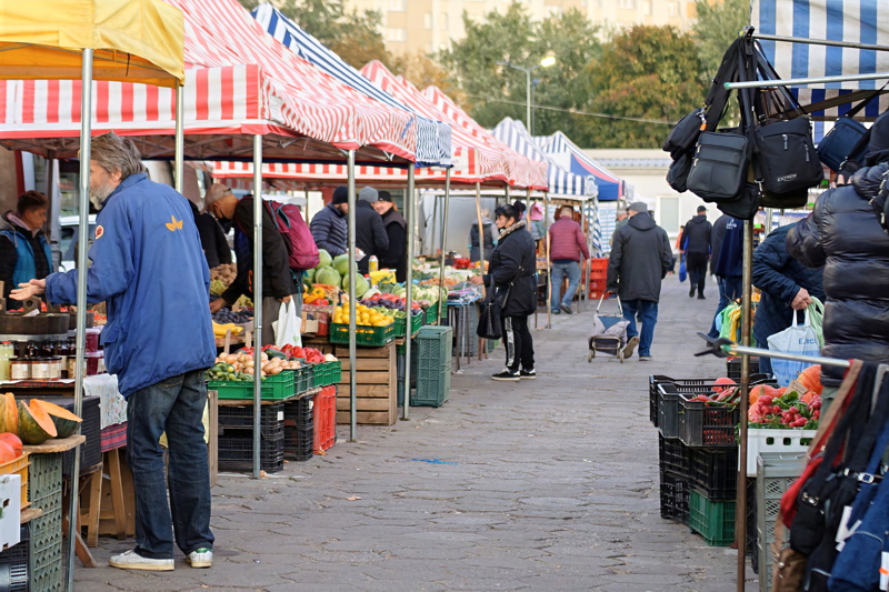 8 - A bustling traditional open-air market in Warsaw
